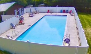 Comfortable Camping Cabins with View of the Cedar River for a Family Weekend Getaway - 1