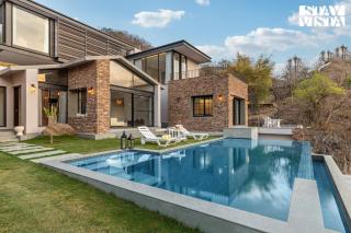 StayVista's Ikebana - Living By The Forest Edge - Mountain-view Villa with Infinity Pool, Lawn, & Indoor-Outdoor Games - 0