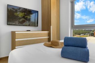 ⁠Amazing 2BR Condo w/ Gym & Pool in Prime Location - Palm-Eagle Beach - 8