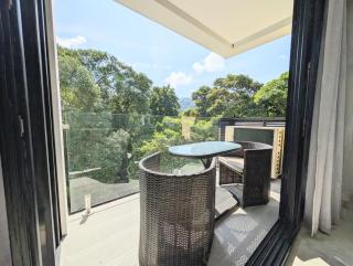 Torres del Mar rainforest-view two-bedroom condo - 0
