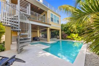 The Oasis at Palmetto – Coastal Chic Retreat w Heated Pool Spa Balconies Steps to Beach - 9