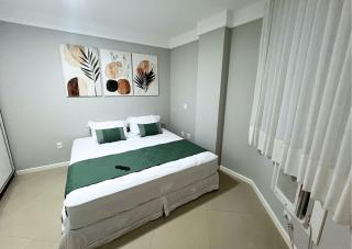 RefugioBacutia- Prédio FRENTE MAR Bacutia- 6 pessoas- 3 Quartos com AR sendo 1 suite - varanda- sala de estar e jantar Ampla -Piscina e Sauna no Prédio - 9