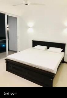 Avenue IX Beach View Apartment - 9