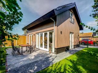 Modern holiday home on Dutch coast with garden - 3