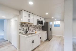 Bright 4BR Home Sleeps 8 Near DT with Backyard Deck - 1