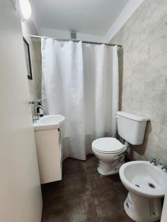 Monoambiente y sala de estar con garage - 1