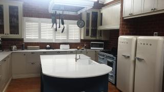 Sip golden sunsets from this endless decked patio - 9