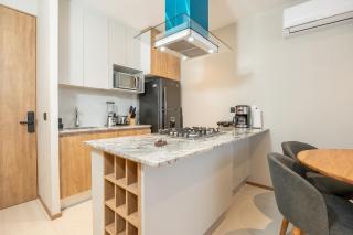 Céntrico depa 2BR con WiFi, alberca y rooftop - 3