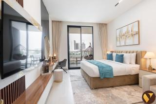 Vogue Vacation Homes, JVC Binghatti Dawn near Circle Mall, Studio Apartment with Balcony and Vibrant Community View, Access to all Amenities - 7