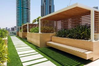Vogue Vacation Homes, JVC Binghatti Dawn near Circle Mall, Studio Apartment with Balcony and Vibrant Community View, Access to all Amenities - 5