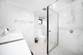 Newly Renovated Modern 2BR Self-Contained Unit - 6