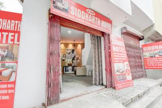 Hotel O Flagship Siddharth Hotel Yamuna Vihar C Block Stand - 2