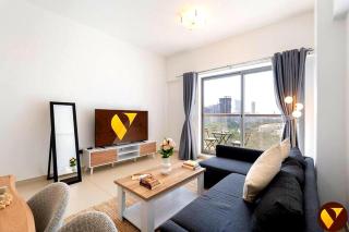 Vogue Vacation Homes, JVC Jeewar Tower near Circle Mall, One Bedroom Apartment with Balcony and Park view, Access to all Amenities - 9