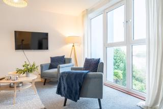 Modern 2BR Apartment with Water Views & Balcony - 0