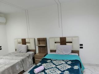 شقة فندقية بغرفتين قرب مول مصر وميدان جهينة - 3