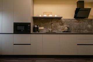 Luxury Airport Studio with Balcony Cozy & Modern - 2