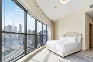 FAM Living - 2BR Apartment with Burj & Canal Views at The Bay - 9