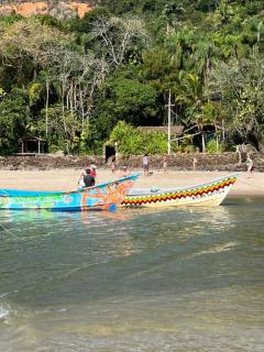 Suíte e sala - Vista Barra do Sahy - 1
