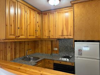 Chimenea y jardín- Calideza y espacio en la planta baja - Besiberri 11 - 2