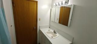 Spacious Family Room with Shared Washroom - 2