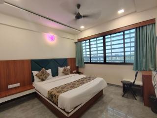 Hotel Earth Inn, Subhash Bridge, RTO Circle, Ahmedabad - 9