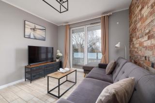 Modern 2-Bedroom Apartment with Remote Workspace in Katowice by Noclegi Renters - 3