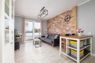 Modern 2-Bedroom Apartment with Remote Workspace in Katowice by Noclegi Renters - 5