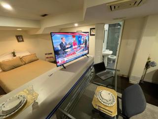 bachelor basement apartment with private kitchenette, washroom, and parking - 0