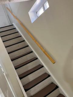 bachelor basement apartment with private kitchenette, washroom, and parking - 1