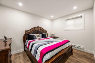 Peaceful 2BR Getaway with Fireplace & Parking Basement Suite - 4