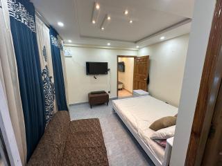 Mini cinema 1 bed Apartment Al Qamar Heights - 7