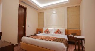 Hotel G L Suites, A Block road no 4 street no 12 mahipalpur - 7