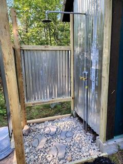 Rustic Converted School Bus with Outdoor Shower Near ORV Trails in Manistee National Forest, Michigan - 8