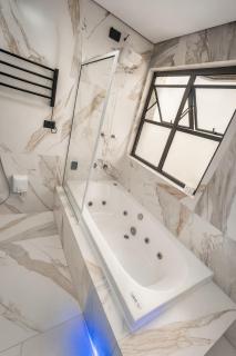 Flat -Hidromassagem privativa e Piscina a 500 mts da praia - 0