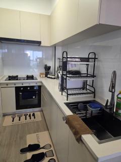 serene stays apartment with fully equipped gym , heated swimming pool ,private parking space and amazing scenic views - 3