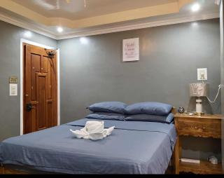 Lovely Bedroom in Lila, Bohol with WIFI, AC and Ref - 4