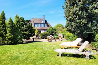 Moderne 1 Zimmer Ferienwohnung im Landhaus Haffkrug mit Terrasse, Gartenblick und Parkplatz in ruhiger Lage - 1