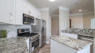 Modern upstairs three bedroom condo! - 6