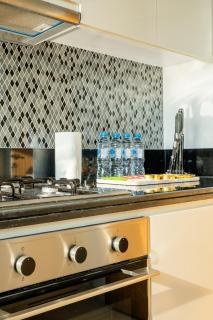 Aarna Signature holiday home - Modern 2BR With Full sea view -High floor - 1