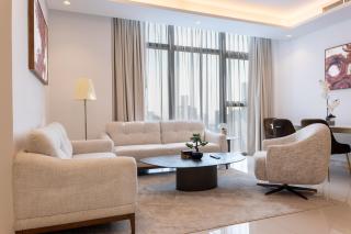 Aarna Signature holiday home - Modern 2BR With Full sea view -High floor - 4