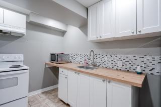 Renovated 2 Bedroom Basement Apartment Near 401 and Amenities - 2