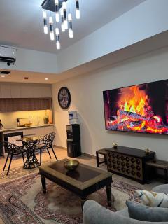 Luxurious 1BR with rooftop pool gym & beach access - 1