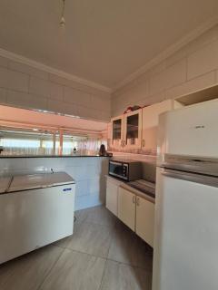 Casa com Piscina - Enseada - Jardim Virginia - 1