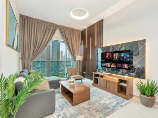 Modern 1BR Near Burj Khalifa with Rooftop Pool, City & Canal Views, Free Parking - 0