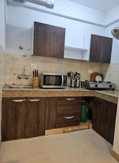 Bulls Eye BNB Room At Logix Blossom Zest - 3