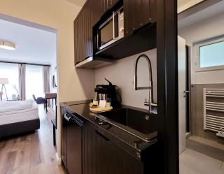 Moderne 1 Zimmer Ferienwohnung mit Sonnenterrasse und Parkplatz, in ruhiger Lage, nur wenige Gehminuten zum Ostsee Sandstrand - 8