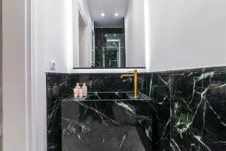 Acropolis 1910s Neoclassical Gem Marble Bathrooms - 3