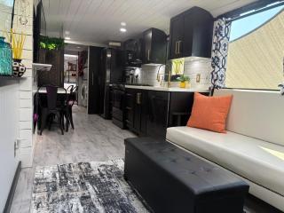 Sleek, Modern, Pet Friendly Custom Tour Bus! - 9