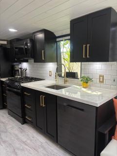 Sleek, Modern, Pet Friendly Custom Tour Bus! - 8