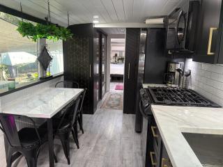 Sleek, Modern, Pet Friendly Custom Tour Bus! - 3